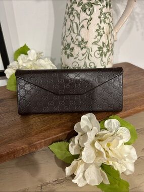 Gucci Brown Embossed GG Continental Case